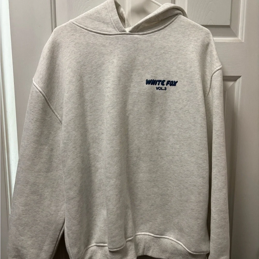 White Fox Boutique Cream Hoodie with Navy Logo - Picture 1 of 2